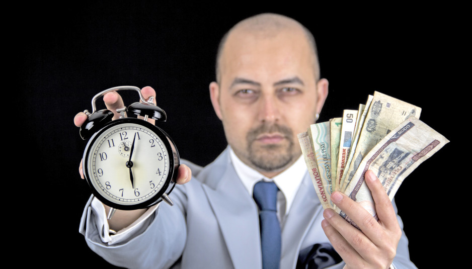 man holding Money and alarm wearing a business suit, race agains